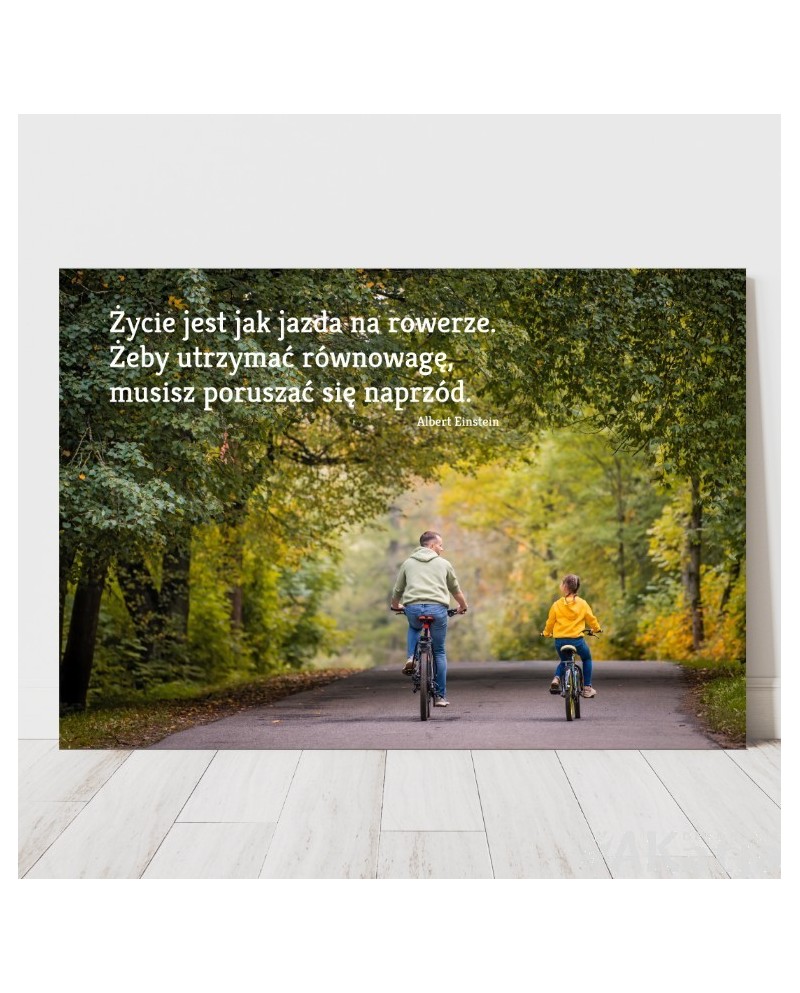 Plakat z napisem: Życie jest jak jazda na rowerze...