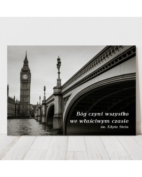 Plakat z napisem: "Bóg czyni wszystko we właściwym czasie"