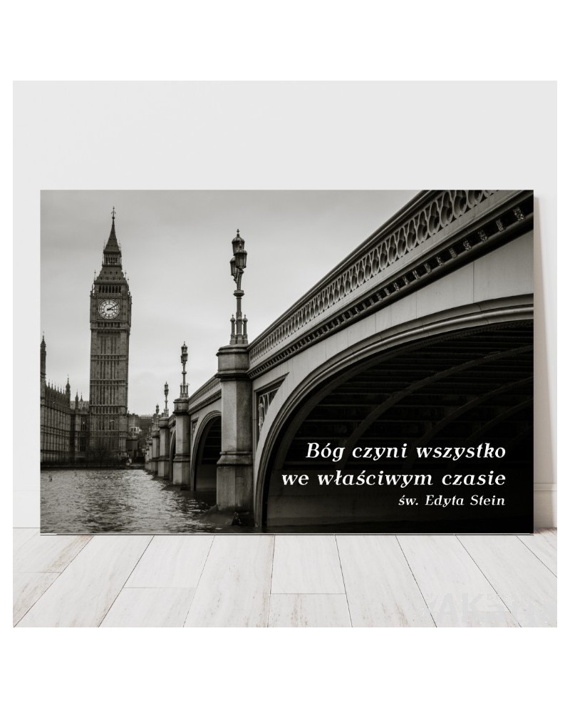 Plakat z napisem: "Bóg czyni wszystko we właściwym czasie"